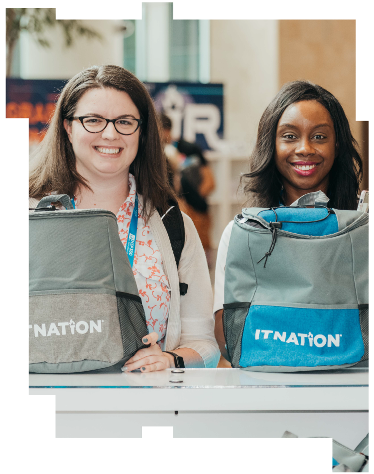 Two smiling women with ConnectWise IT Nation backpacks